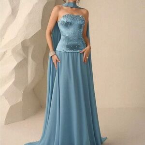 Elegant Sky Blue Strapless Evening Dress with Cape